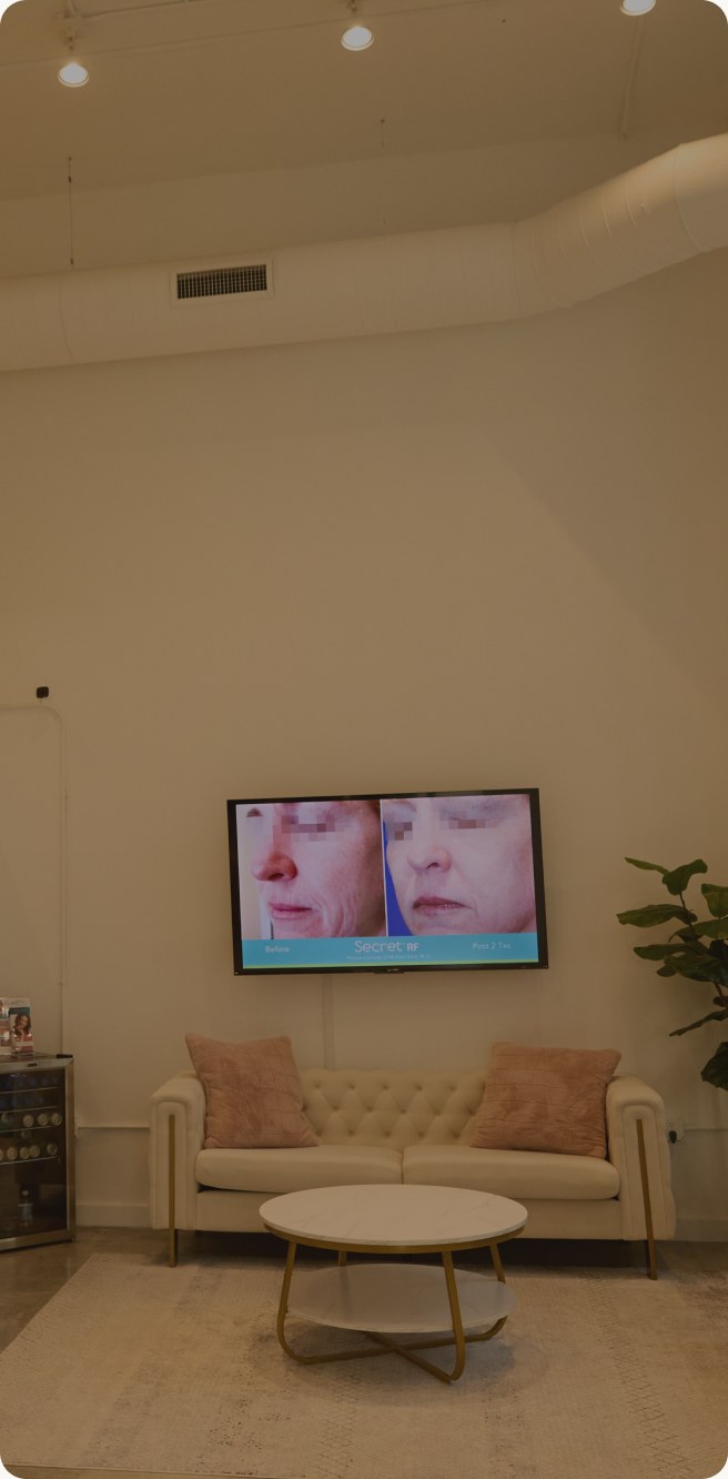 Lavish Laser MedSpa lounge with a round side table and a seating area
